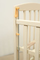 AMELI - детская кроватка с подвижной боковиной, дугами и колесами ТМ ГОЙДАЛКА (фото 15 из 27)